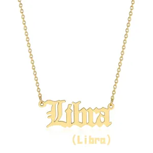 Close-up of golden stainless steel Libra necklace with elegant cursive script pendant