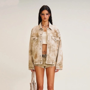 Oversize retro distressed denim jacket with white splatter and metallic cross buttons