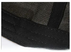 Macro detail of breathable mesh lining and reinforced stitching inside the baseball cap