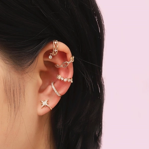 Elegant gold ear cuffs with cubic zirconia and star charms for non-pierced ears