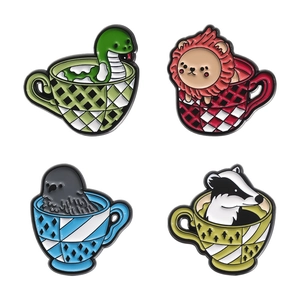 Set of four colorful animal tea cup enamel pins featuring lion snake crow and badger motifs