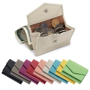 Detail of a beige leather trifold wallet showing coin compartment and colorful options