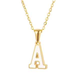 Close-up of golden stainless steel letter A pendant necklace with white enamel inlay