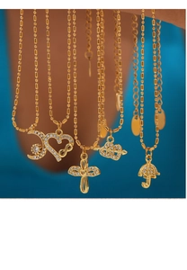 Close-up of gold-plated titanium steel necklaces with heart and cross pendants