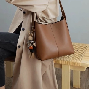 Minimalist PU Leather Bucket Bag Large Capacity Shoulder Bag With Rabbit Charm For Women Daily Commute Versatile