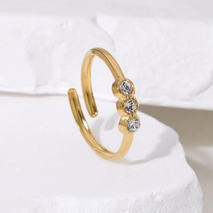 Minimalist 18K gold plated titanium steel ring with three clear cubic zirconia stones