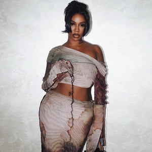 Women's chic two-piece mesh set with one-shoulder crop top and matching printed maxi skirt