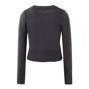 Detailed back view of dark grey cropped knit cardigan with ribbed cuffs and fine texture