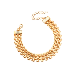 Detailed close-up of a triple-layered gold link bracelet with adjustable lobster clasp