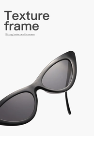 Detailed close-up of premium cat-eye sunglasses with glossy black frame and grey lenses