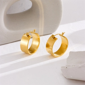 Polished thick gold hoop earrings for women with minimalist retro aesthetic design