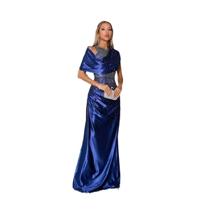Elegant starry blue evening dress with sparkling rhinestones and a high side slit detail