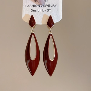 Detail view of wine red hollow drip earrings with hypoallergenic S925 silver needles