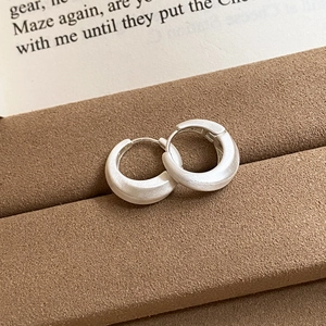 18K gold plated minimalist crisscross hoop earrings in brushed silver finish on velvet box