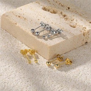 Macro shot of S925 sterling silver ball studs in gold and silver finish with S925 hallmark