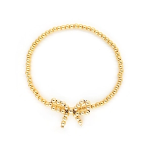 Elegante bracciale elastico con perline in oro 18K e ciondolo a fiocco per donna