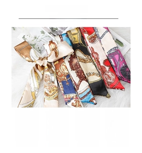 Detail of printed silk twill ribbon scarf featuring classic equestrian pattern