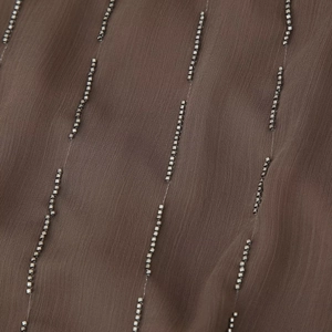 Bohemian brown summer dress fabric with shimmering silver beadwork details