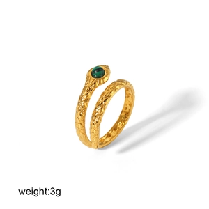 Vintage 18k gold snake open ring with green malachite gemstone on white background