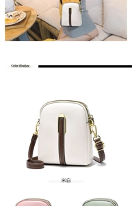Detail of off-white textured leather mini bag with brown strap and gold metal hardware