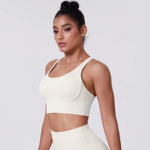 Macro della trama del reggiseno sportivo bianco crema e dell'orlo largo stabile