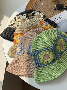 Handmade crochet floral bucket hat in bohemian style with colorful granny square patterns