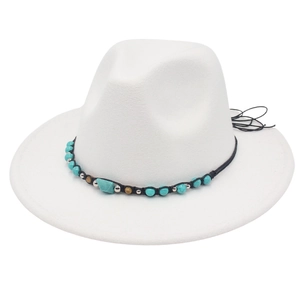 Detail of white wide-brim felt hat with bohemian turquoise and metal bead trim