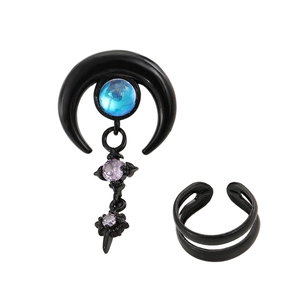 Detail of gothic black moon earring set with purple stars and blue bead insets