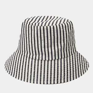 Detail of black and white striped bucket hat with subtle rhinestone embellishments