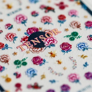 Self-adhesive floral nail stickers with 3D embossed rose and bee designs by Tensor