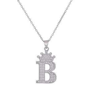 Detailed view of silver crown letter B pendant with micro-pave cubic zirconia stones