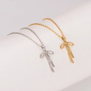 Elegant bow pendant necklaces in gold and silver finish with delicate O-chains
