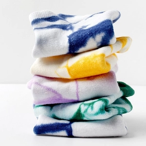 Stack of 5 tie-dye street style cotton ankle socks in blue, yellow, purple, and green
