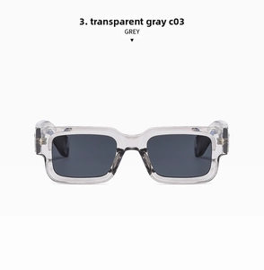 Vue de face des lunettes de soleil rectangulaires gris transparent avec verres gris