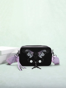 Detail of matte black crossbody bag with purple butterfly print and silver rivets
