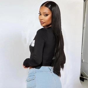 Detail showing smooth texture and glossy finish of black long straight hair extensions