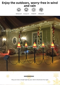 Solar powered Santa Claus garden stakes with waterproof design and five LED light pillars