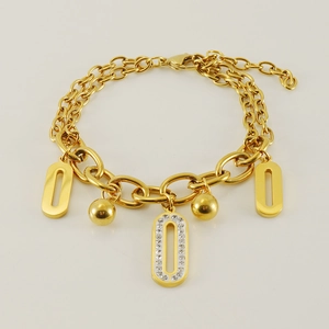 Bracelet double couche élégant en acier inoxydable doré 18 carats avec breloques ovales serties