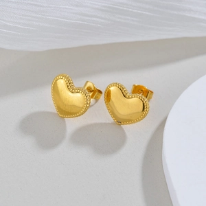 Chic gold irregular heart stud earrings with beaded border in polished stainless steel