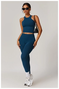 Detail of high-waist yoga set in navy blue featuring ribbed waistband and racerback top