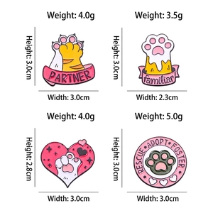 Cartoon cat paw enamel pins set with heart shape and rescue theme badges for clothing