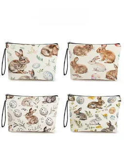 Pattern display of four canvas Easter bags with watercolor rabbits and colorful egg prints