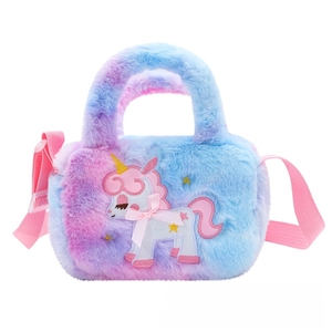 Detail of plush rainbow unicorn bag with satin bow and adjustable pink shoulder strap