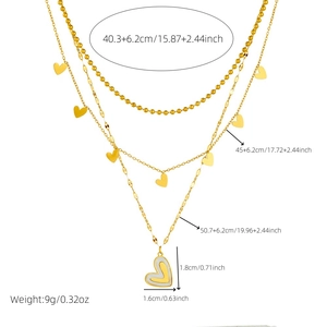 Gold layered stainless steel necklace with heart pendants and detailed size annotations