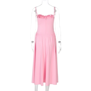 Detail of pink midi dress showing the slim fit back zipper and pleated waistline