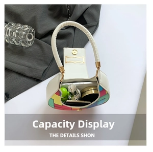 Top macro view of the minimalist crescent bag interior showing daily essentials capacity