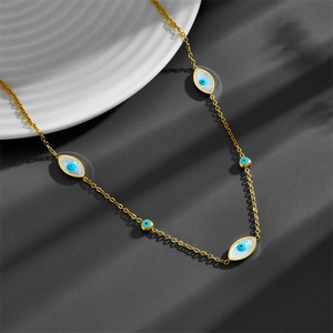 18K gold plated stainless steel necklace featuring blue evil eye charms and beads