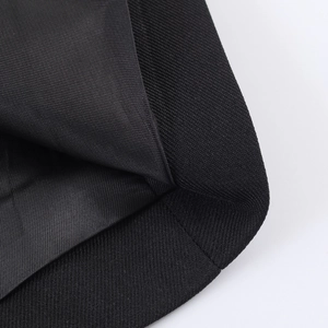 Women's slim-fit blazer with ruffle hem featuring premium black twill fabric texture