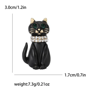 Fashionable black enamel cat brooch with green gem eyes and sparkling rhinestone collar