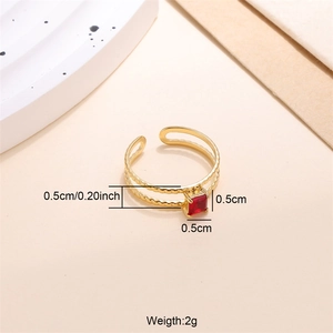 Detail of 18K gold plated double layer ring featuring a square red zircon setting